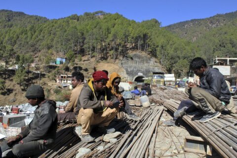 Digging to rescue 41 workers trapped in a collapsed tunnel in India delayed for mechanical issue