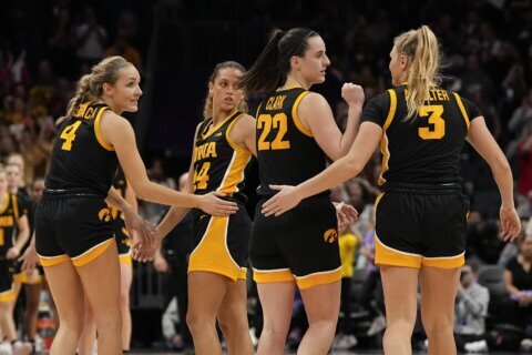 'Generational player' Caitlin Clark puts on a show, dropping 44 as No. 3 Iowa tops No. 8 Va Tech