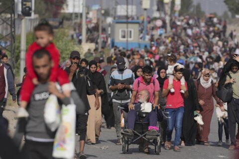 Civilians flee north Gaza or shelter at a hospital as Israel and Hamas battle in the city