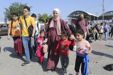 Confusion, frustration and hope at Gaza's border with Egypt as first foreign passport-holders depart