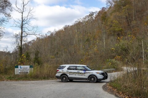 Collapse of Kentucky plant being demolished at abandoned mine leaves 1 worker dead, another trapped