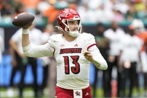 No. 9 Louisville tops Miami 38-31 to clinch spot in the ACC championship game