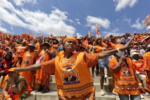 Madagascar police impose curfew on eve of presidential election, after polling stations torched