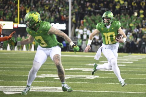 Oregon defeats Oregon State 31-7 for a spot in the Pac-12 title game as rivalry ends for now