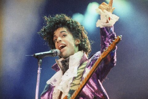 Prince’s puffy ‘Purple Rain’ shirt and other pieces from late singer’s wardrobe go up for auction