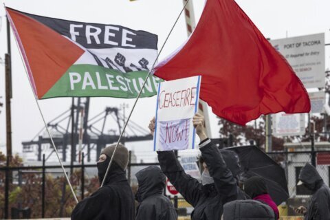 Protesters calling for Gaza cease-fire block road at Tacoma port while military cargo ship docks