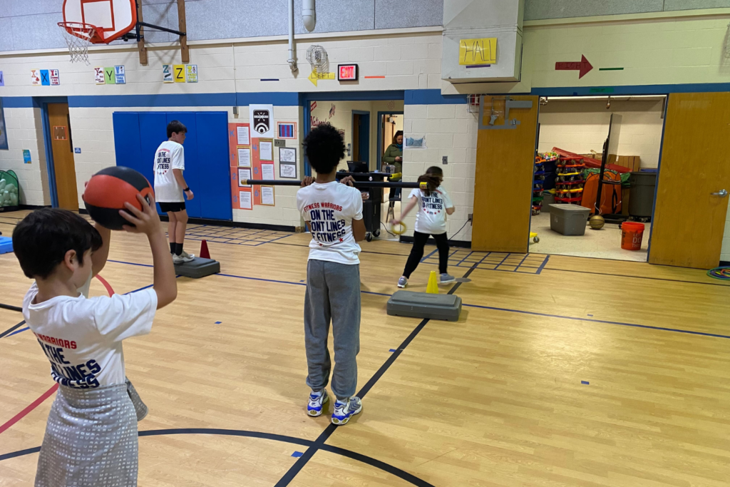 Fifth and sixth-grade students at Chesterbrook Elementary School in McLean, Virginia, take part in the "Fitness Warriors" program