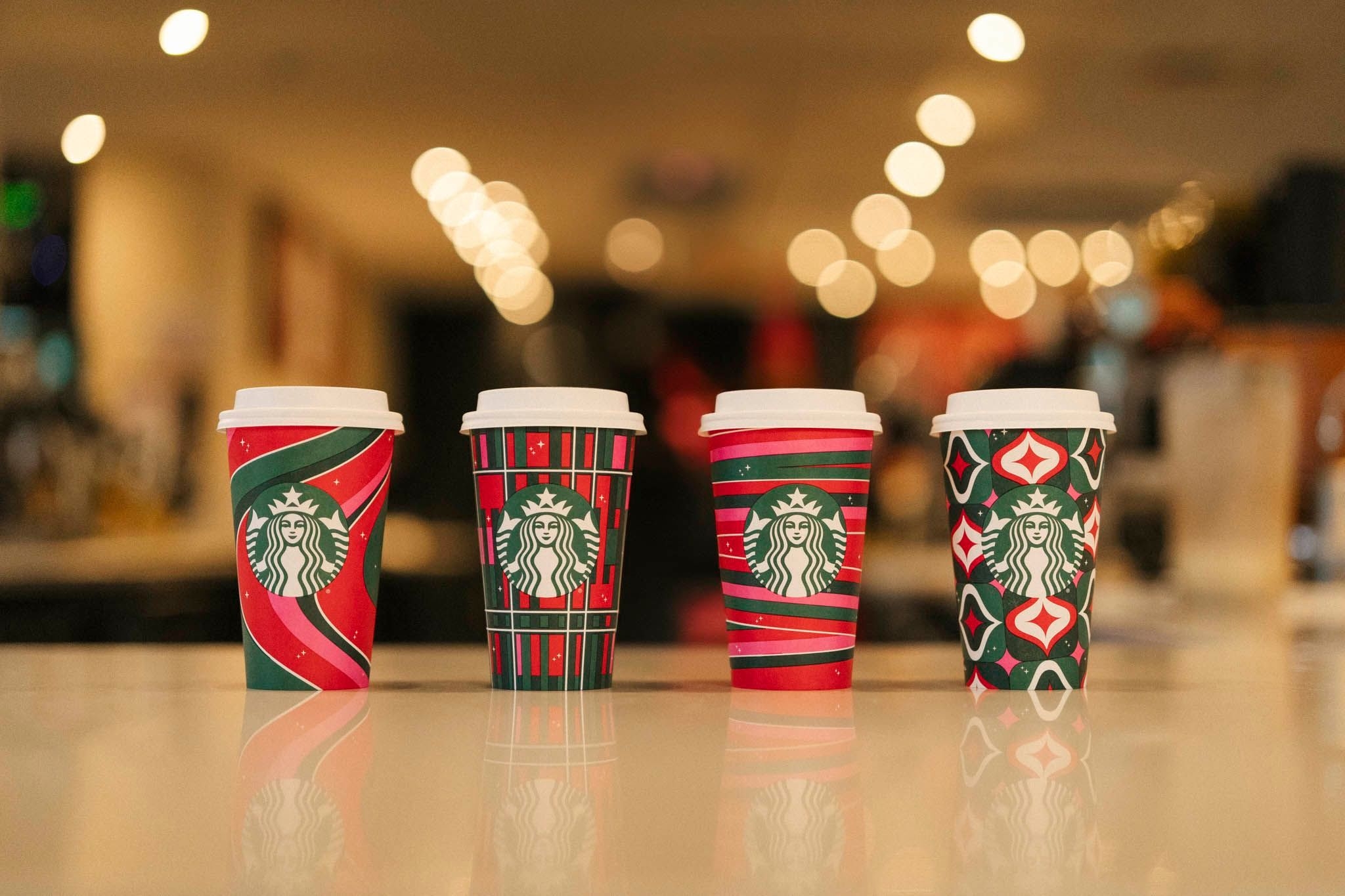 Starbucks has released 12 new holiday cup designs. Check them out.