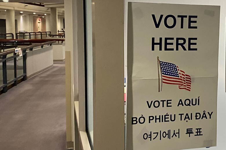 A "vote here" sign directing voters inside the Fairfax County Government Center in Fairfax, Virginia