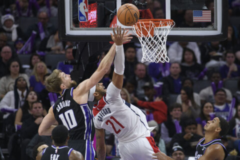 Another triple-double for Domantas Sabonis sends Kings past Wizards 143-131
