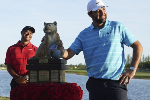 Scheffler makes it look easy for 3-shot victory in the Bahamas. Tiger Woods finishes 18th