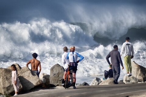 Huge surf pounds West Coast and Hawaii, flooding some low-lying areas