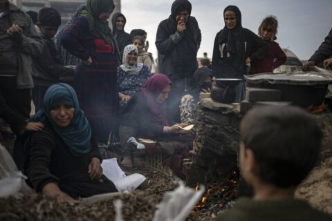 At least 68 killed in central Gaza in airstrike, adding to weekend's bloodshed