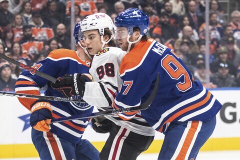 Bedard scores early but McDavid gets 2 assists to lead Oilers past Blackhawks 4-1 for 8th straight