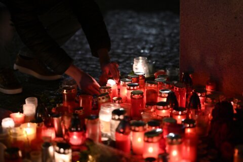 Police seek a motive as Prague mourns the 14 people killed in the nation’s worst mass shooting