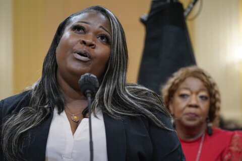 Georgia election worker tearfully describes fleeing her home after Giuliani's false claims of fraud