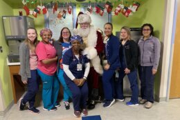 Santa with doctors and nurses