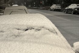 Snow on top of a car