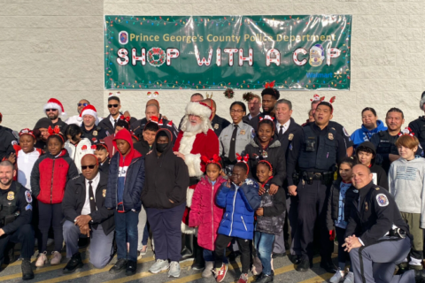 Sirens, Santa and lots of smiles as kids get to shop with a cop in Prince George's County