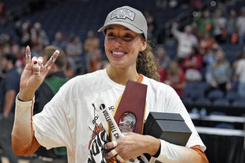 Madisen Skinner, freshman Ella Swindel help Texas defend volleyball title, sweep No. 1 Nebraska