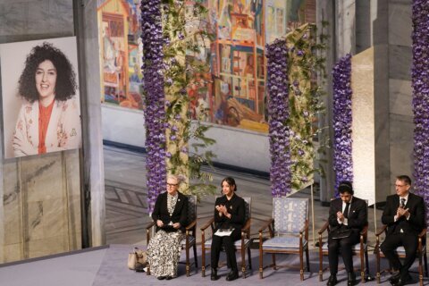 Children of imprisoned Iranian activist Narges Mohammadi accept the Nobel Peace Prize on her behalf