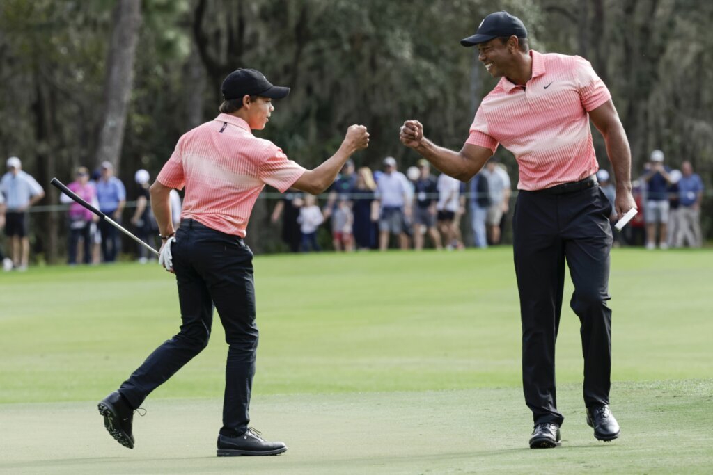 Kuchar and son build 3-shot lead. Tiger Woods and son have to settle for a nice family affair