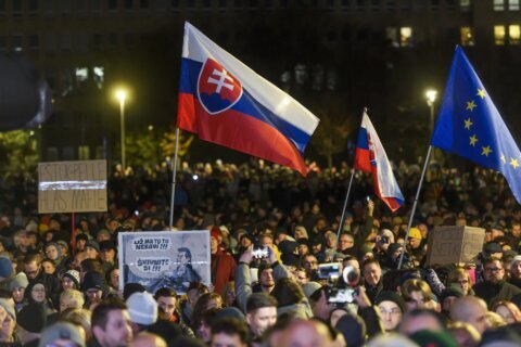 Thousands rally in Slovakia to condemn the new government's plan to close top prosecutors' office