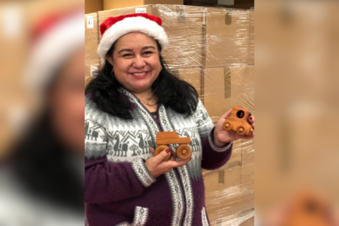 A weekly food distribution event gets a festive touch — and a visit from Santa