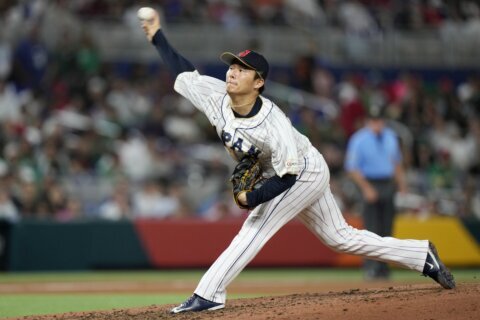 The Yankees have already given Yoshinobu Yamamoto a No. 18 jersey. Aaron Boone hopes he keeps it