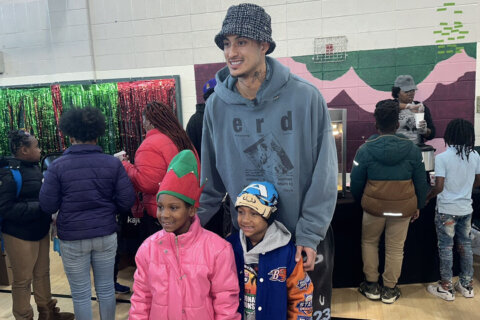 Wizards star Kyle Kuzma gives back to DC families this holiday season