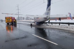 A small commuter airplane that had just taken off from Dulles International Airport made an emergency landing on the Loudoun County Parkway near the airport on Jan. 19, 2024. (Courtesy Virginia State Police)