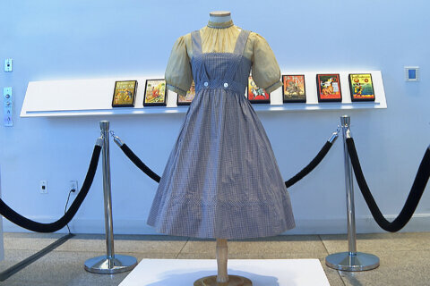 Catholic U. said auction of ‘Wizard of Oz’ dress will happen as a temporary injunction is lifted