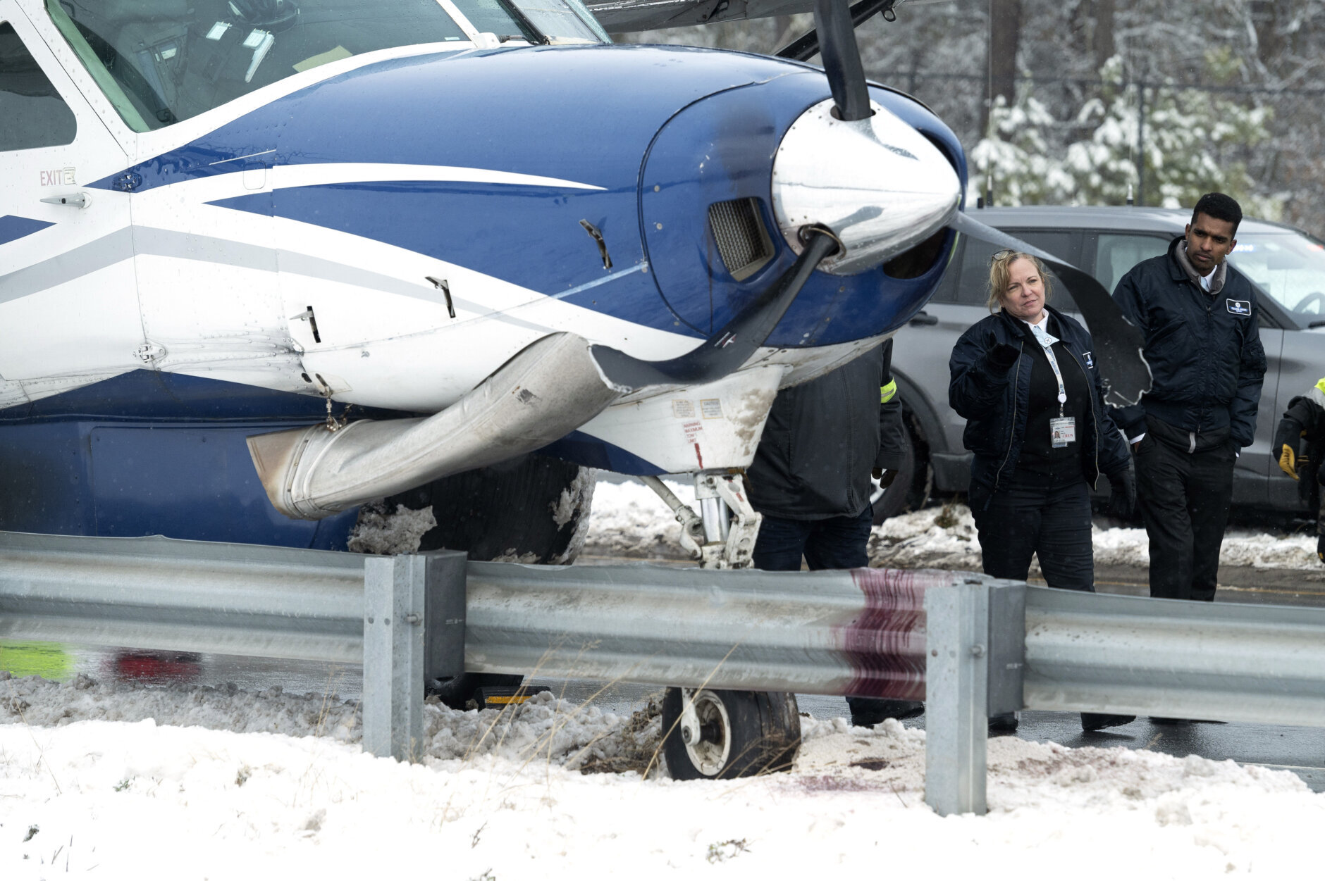 Southern Airways Express flight 246 is seen having made an emergency landing on the Loudoun County Parkway, Friday afternoon, Jan. 19, 2024, in Dulles, Va., near Washington Dulles International Airport. There were seven people on board the single-engine Cessna 208 Caravan, according to Federal Aviation Administration, and no injuries were reported. (AP Photos/Clifford Owen)