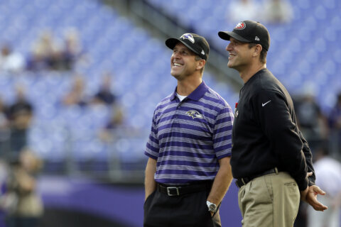 Over a decade after their Super Bowl matchup, Harbaugh brothers soaring again with Michigan, Ravens