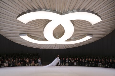 Chanel’s spring couture show is a button-inspired ballet on the Paris runway