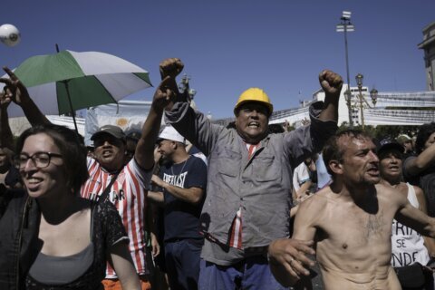 Argentina's president faces 1-day general strike as foes seek to derail his austerity agenda