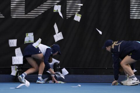 Protester throws papers on court, briefly disrupts Australian Open match between Zverev and Norrie