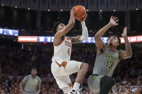 Hunter's 21 points and buzzer-beating layup send Texas over No. 9 Baylor 75-73