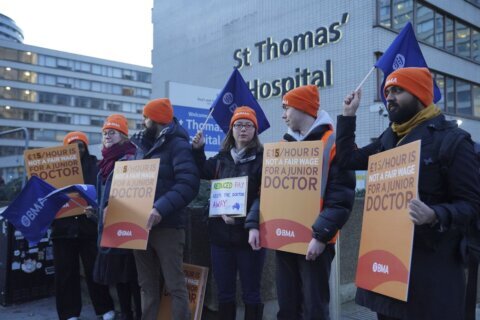 Thousands of doctors in Britain walk off the job in their longest-ever strike