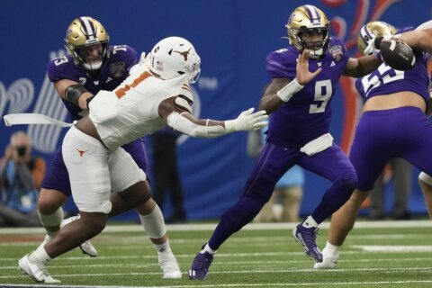 Michael Penix Jr. leads No. 2 Washington to 37-31 victory over Texas and spot in national title game