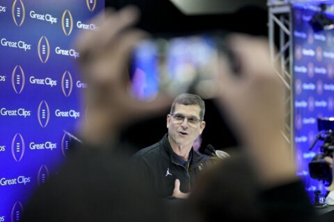Harbaugh’s future at Michigan is subplot to CFP title game as Washington tries to lock up DeBoer