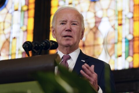 Biden condemns white supremacy in a campaign speech at a church where Black people were killed