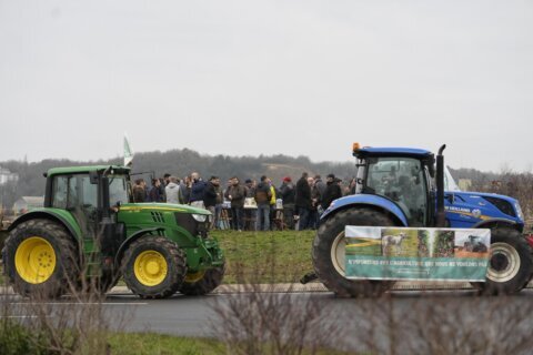 French farmers edge closer to Paris as protests ratchet up pressure on President Macron