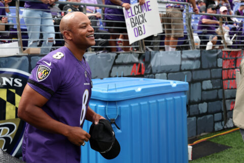 Maryland Gov. Wes Moore shotguns beer with fellow Ravens superfans at tailgate