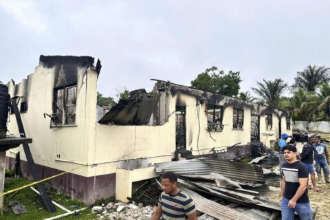 A probe into a Guyana dormitory fire that killed 20 children finds a series of failures