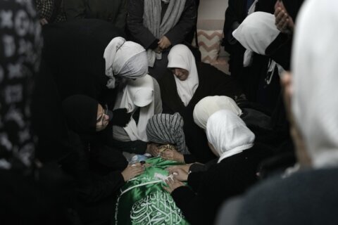 Israeli forces dressed as civilian women and medics kill 3 militants in a West Bank hospital