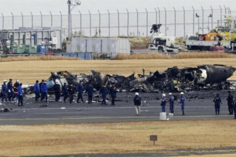 Investigators focus on air traffic communication after a fatal Tokyo runway crash