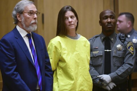 Trial of woman charged with covering up killing of mother of 5 begins in Connecticut