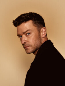 Justin Timberlake in a black jacket.