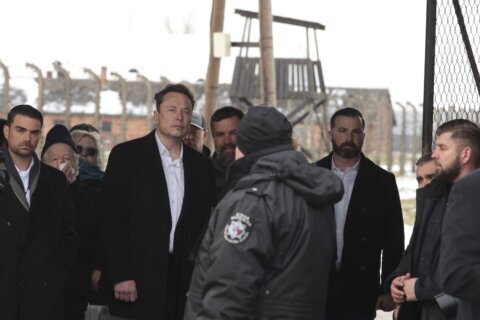 Elon Musk visits Auschwitz after uproar over antisemitic messages on X